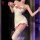 Woman modeling nightsigh nightsere sexy plush maid costume with christmas bear crop top, bodycon dress, and matching accessor...