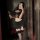 Seductive nightsiyese lace babydoll set featuring sheer mesh bodysuit, boned corset, and high-waisted skirt, perfect for bold...