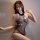 Woman wearing nightsiyese sexy transparent lace bodysuit – sheer, alluring one-piece lingerie with halter neck and mesh detai...