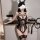 Woman in black lace lingerie set with stockings and cat ears, holding a whip.