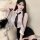A woman wearing a sheer blouse with a black tie, paired with a tight pencil skirt, embodying an air hostess style office outf...