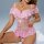 Woman wearing pink lace backless shapewear bodysuit with sheer romantic lingerie design, featuring delicate floral patterns a...