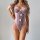 Woman wearing a pink leopard print bodysuit with bow details and lace-up sides, styled as sexy lingerie for parties or clubwe...