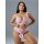 Woman modeling pink romantic lace lingerie set with floral sheer details, featuring bra and panties for date night.