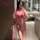 A woman models a pinxian original chinese-inspired lingerie set featuring a cherry blossom design, perfect for role play slee...
