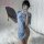 A woman poses with a fan, wearing a sheer blue pinxian sexy ink-wash jiangnan qipao lingerie set featuring floral designs and...