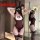 Woman modeling a plus size bunny costume bodysuit, featuring a tight-fitting design with lace trim and bunny ears, ideal for ...