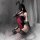Woman in plus size bunny costume with sheer lace bodysuit, open crotch, thigh highs, and bunny ears for role play.