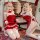 Two women pose in festive attire, wearing a red velvet christmas-themed lingerie set featuring a bralette and backless sleep ...