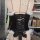 Elegant victorian-style corset with black ribbon lacing and fluffy white accents, perfect for holiday-themed outfits.