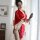 A woman models a red floral japanese kimono-style lingerie set, featuring elegant design elements and traditional motifs, per...