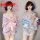 Two models wearing plus size japanese kimono lingerie sets with floral prints and bows, featuring sheer robes as sexy sleepwe...