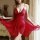 Woman wearing a red lace sleep dress with adjustable straps, featuring a sheer mermaid-style satin design.