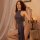A stylish gray halter dress with a high slit, perfect for curvy women seeking an elegant and sexy look. ideal for evening wea...
