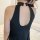 Sexy black halter neck dress with deep back cutout, perfect for plus-size women seeking elegant sleepwear.