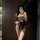 Sheer black lace bodysuit with bunny ears and tail, featuring push-up cups and open-crotch design for sensual sleepwear.