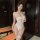 White steel-boned push-up bodysuit with sheer mesh, lace trim, and open-crotch design for small bust.