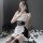 Sexy maid costume outfit featuring black and white design with lace details, perfect for role play and seductive bedroom wear...