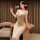 A woman elegantly poses with a rose, wearing a beige plus-size lingerie dress featuring lace sleeves and a high slit, perfect...