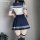 Front view of a sailor uniform set featuring a white crop top with navy blue accents, paired with a pleated skirt and knee-hi...