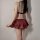 Back view of curvy woman wearing plus size sailor uniform lingerie set with pleated skirt and adjustable straps.