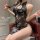 Woman wearing a plus size seductive lingerie set featuring a sheer, floral-patterned dress with cut-out details.