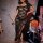 Sexy halloween maid costume for women featuring a plus-size tempting lace dress with thigh-high slit and strappy heels, perfe...