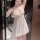 Woman wearing plus size sexy lace sleepwear with deep v thin cami nightgown and intimate lingerie set in a modern bathroom se...