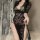 Woman wearing plus size sexy lace sleepwear set with sheer mesh, high slit, and provocative uniform style.