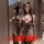 Curvy woman in mirror wearing plus size sexy leopard lingerie set with cat ears, bodycon sleepwear outfit for curvy women.