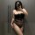 Curvy woman wearing the plus size sexy lingerie set - midnight passion nightwear, featuring a sheer black maid costume with l...