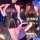 Woman modeling a black, sheer, pleated mini leather skirt set with a halter top. this busty, uniform-style lingerie outfit fe...