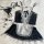 Black lace lingerie set with white apron, sheer top, matching panties, and accessories for women.