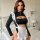 Sexy maid costume for women featuring a black crop top with cutouts, long sleeves, and a white apron with ruffles. perfect fo...