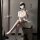 A stylish nurse outfit featuring a white dress with buttons, cap, and stockings, perfect for a seductive look.