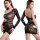 Curvy woman modeling a black rhinestone mesh bodysuit with long sleeves, cutouts, and an open back.