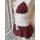 Red plaid three-piece lingerie set with white lace trim and bows, displayed on a mannequin.