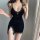 Sexy black velvet cami set with lace trim and low neckline, perfect for plus-size women seeking stylish and daring sleepwear.