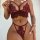 Woman wearing prilin lace lingerie set with eyelash trim, featuring a sexy bra and panty two-piece outfit in deep red.