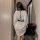 Elegant white dress with black leather accents, featuring a harness design and strappy details, perfect for an edgy adult fet...