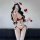 A woman poses with a smartphone, wearing a red and white chinese-inspired vintage-style silk lingerie set. the set includes a...