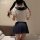 A person wearing a japanese-style jk uniform set, featuring a sailor top with puffed sleeves and pleated skirt, paired with s...