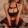 Sexy jk uniform set for women featuring a red bow pleated skirt, black halter top, and stockings with bows, perfect for rolep...