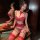 Woman modeling red lace bodysuit with sheer panels, bow detail, and open-crotch design for small bust.