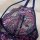 Close-up of pure & alluring lace sleep dress – ultra-thin sheer mesh sensual nightgown with pink floral embroidery on navy bl...
