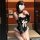 Elegant maid-themed lingerie set featuring a black bodice with white accents, perfect for sensual sleepwear with sophisticate...