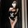 Elegant maid-themed lingerie set featuring a black bodice with white accents and a bow detail, perfect for sensual sleepwear ...