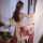 A woman elegantly poses wearing a vintage chinese hanfu set, featuring a dunhuang flying phoenix embroidered halter bodice pa...