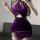 Woman wearing purple velvet lingerie set with lace trim, featuring halter top and mini skirt for cosplay or role play.