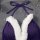 Purple velvet bunny lingerie set with white fur trim, halter neck top, and bow details for playful roleplay.